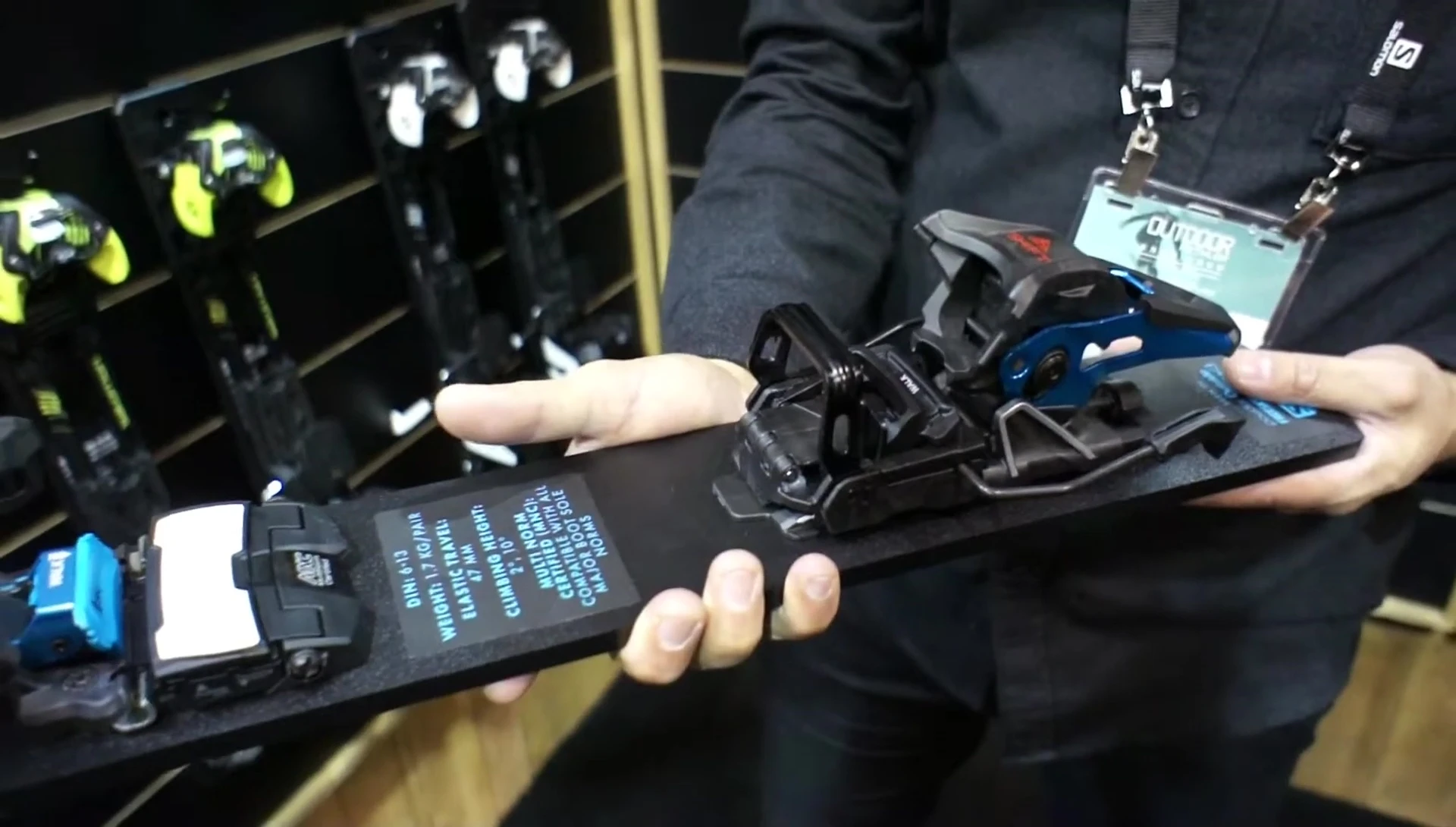 Person changing the binding from walk to ski mode