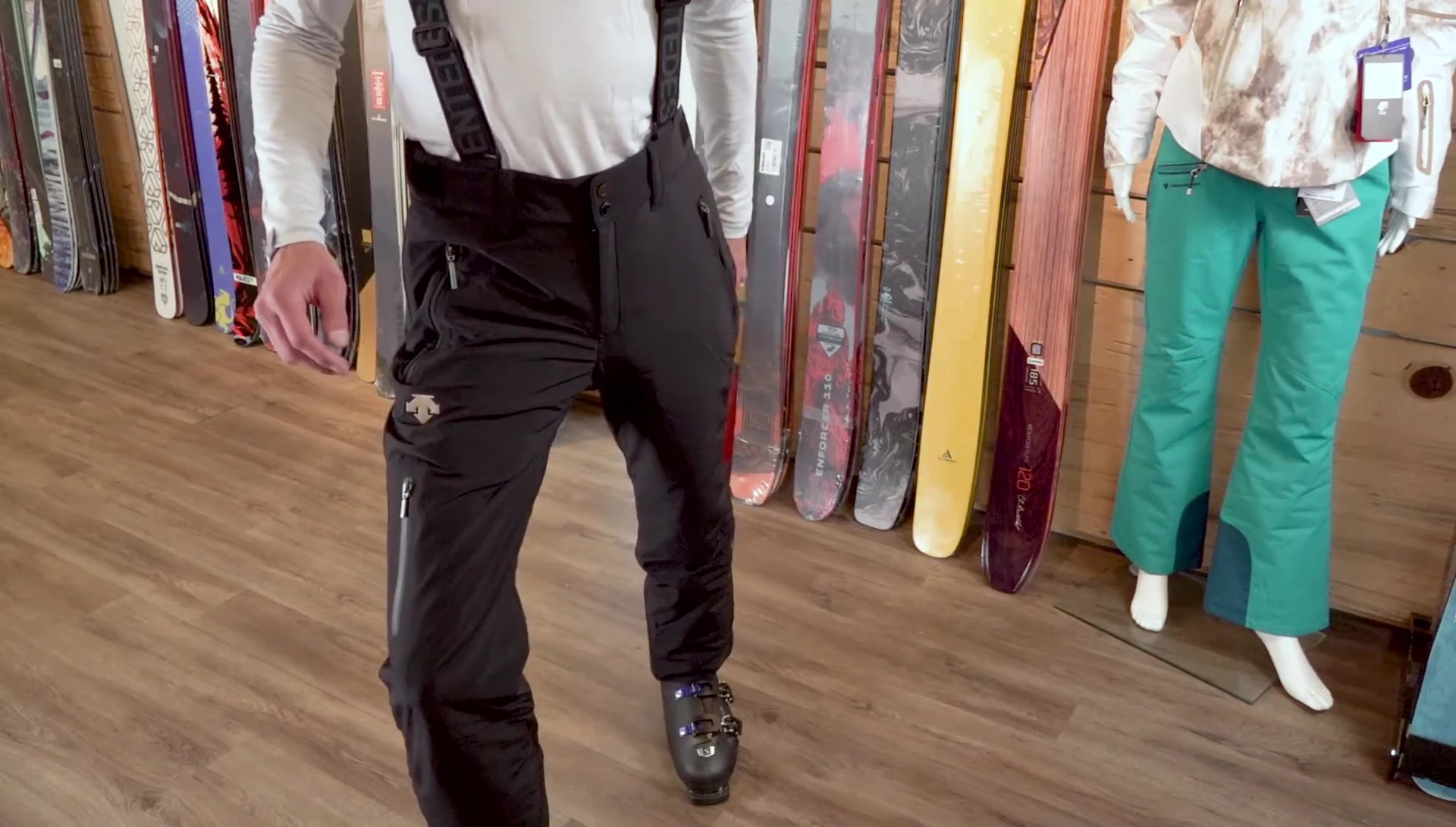 Showcasing the adjustable waist and removable suspenders