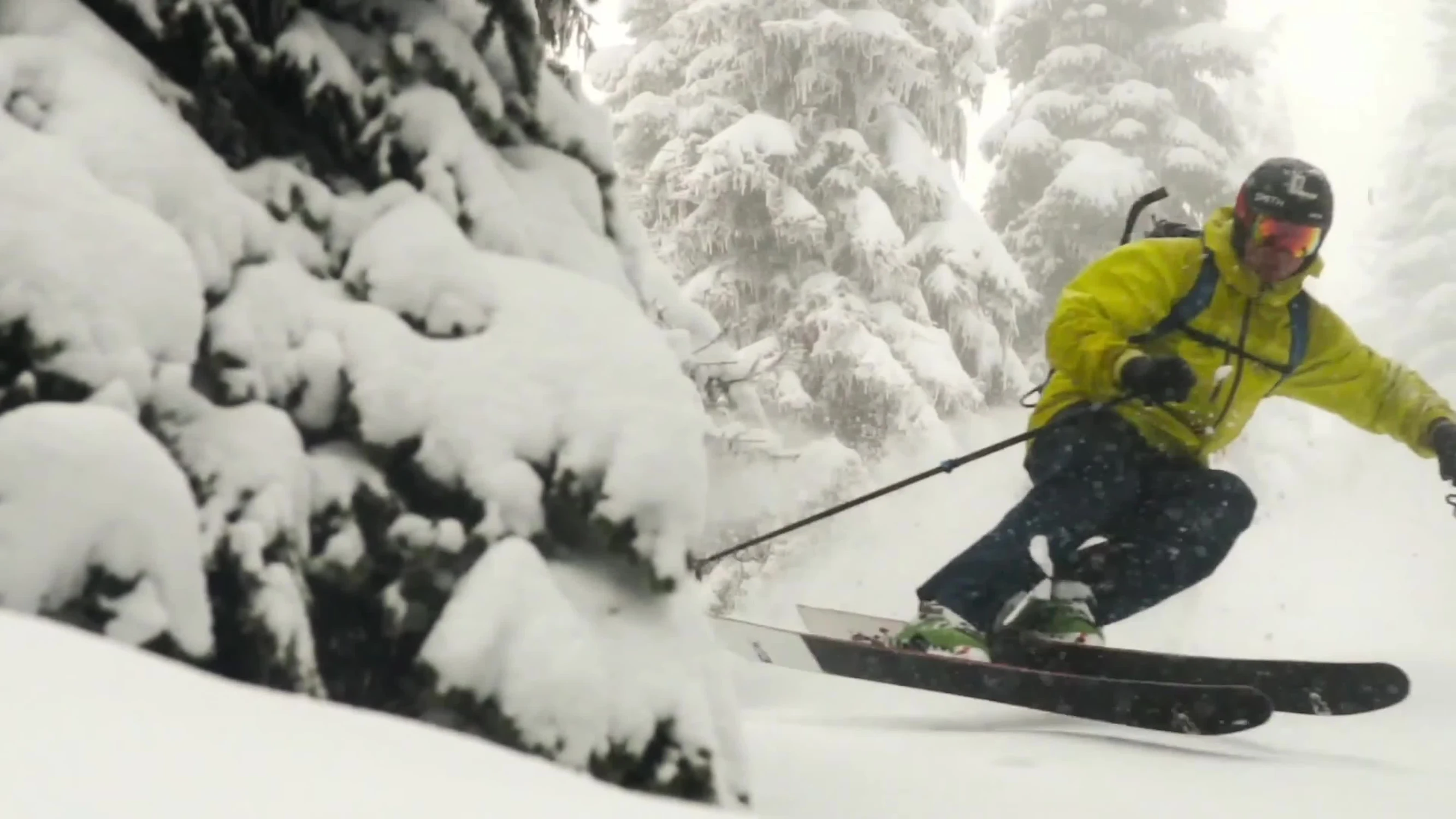 Person skiing in varied snow conditions.