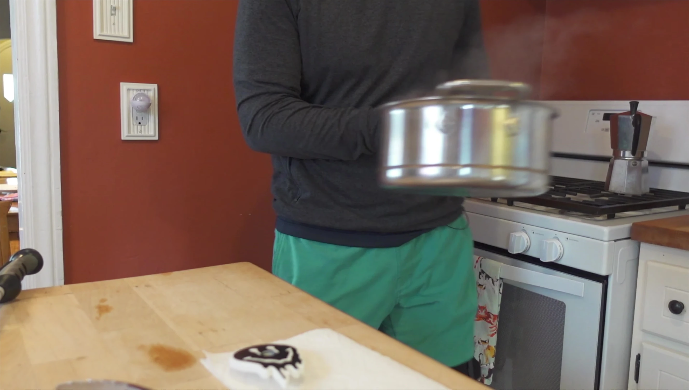 Preparing to submerge the baskets in boiling water