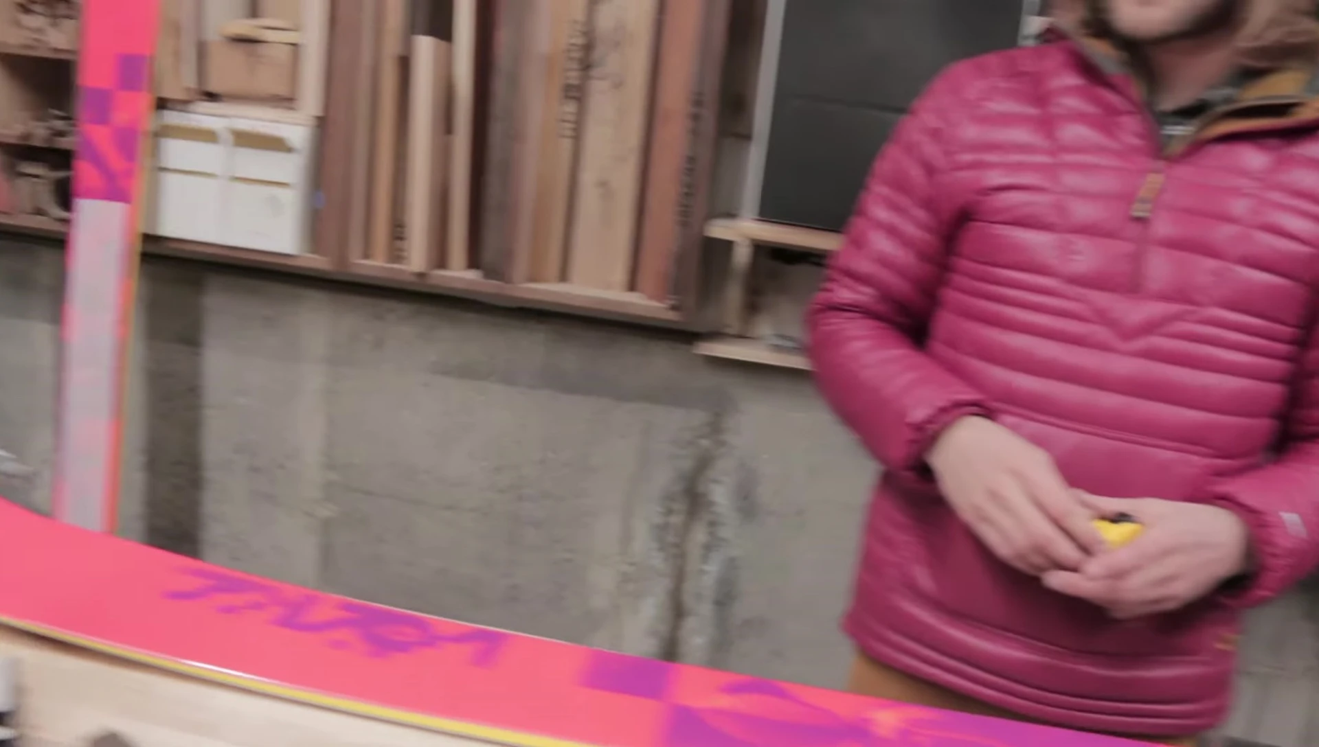 Close-up of masking tape being applied to the ski.