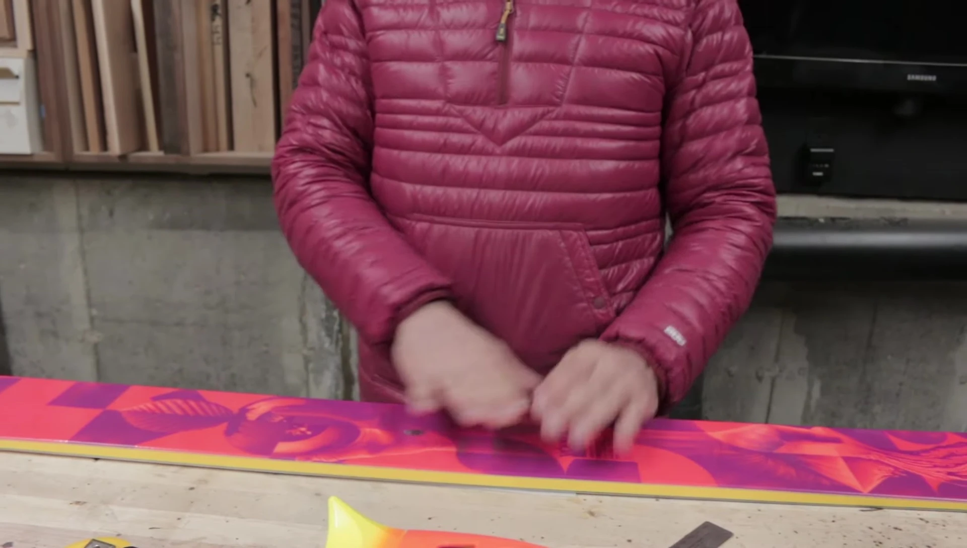 Masking tape applied to the ski, showing the center lines.