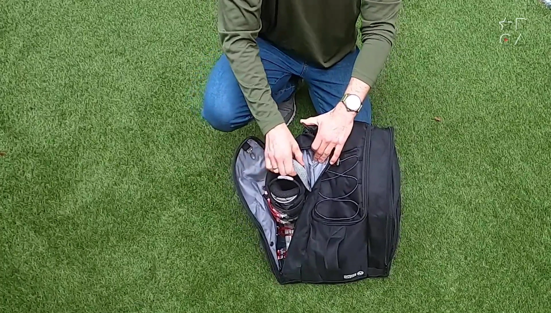Showing a size 48 ski boot fitting comfortably inside the bag.